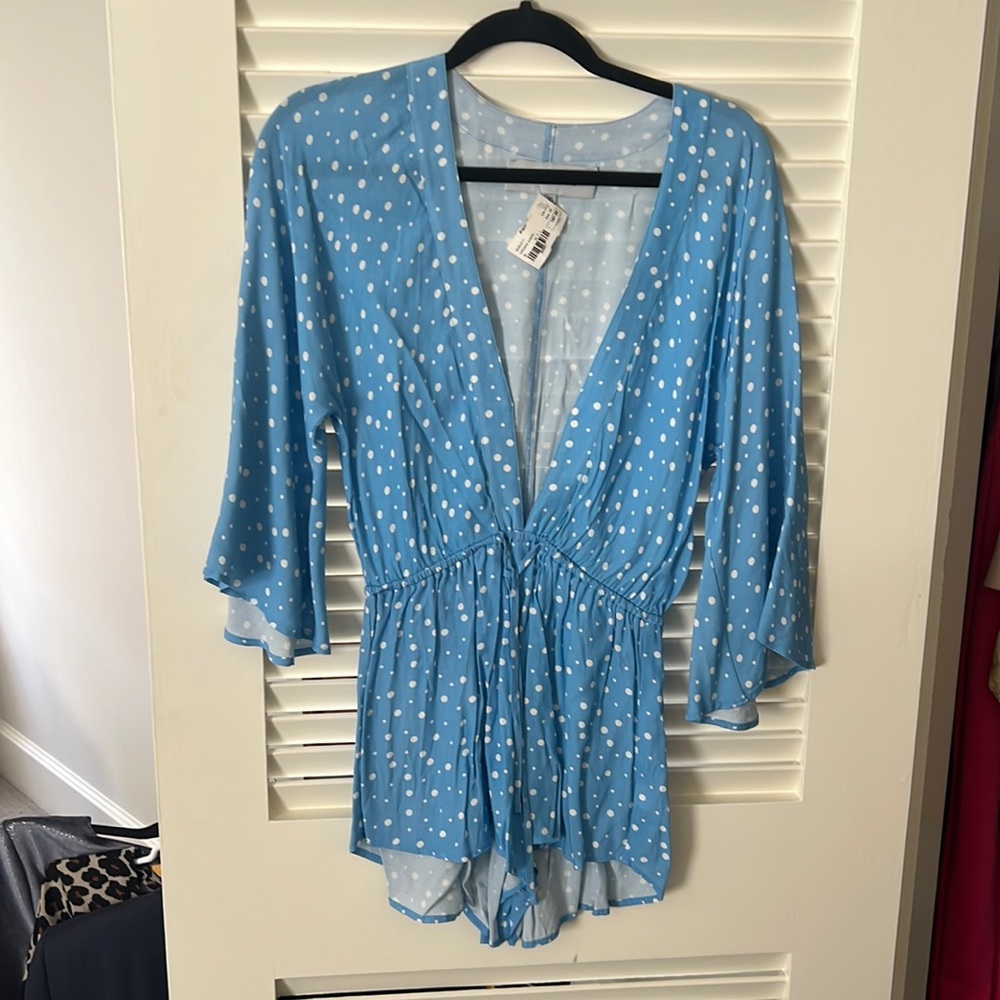Blue Life blue and white polka dot romper.